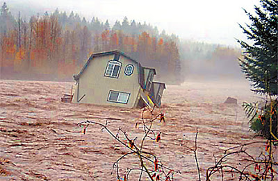 Yes, that’s a house. It sat on the banks of the Cowlitz River before the river rose over its banks and eroded out the foundation during the November 6-7 atmospheric river